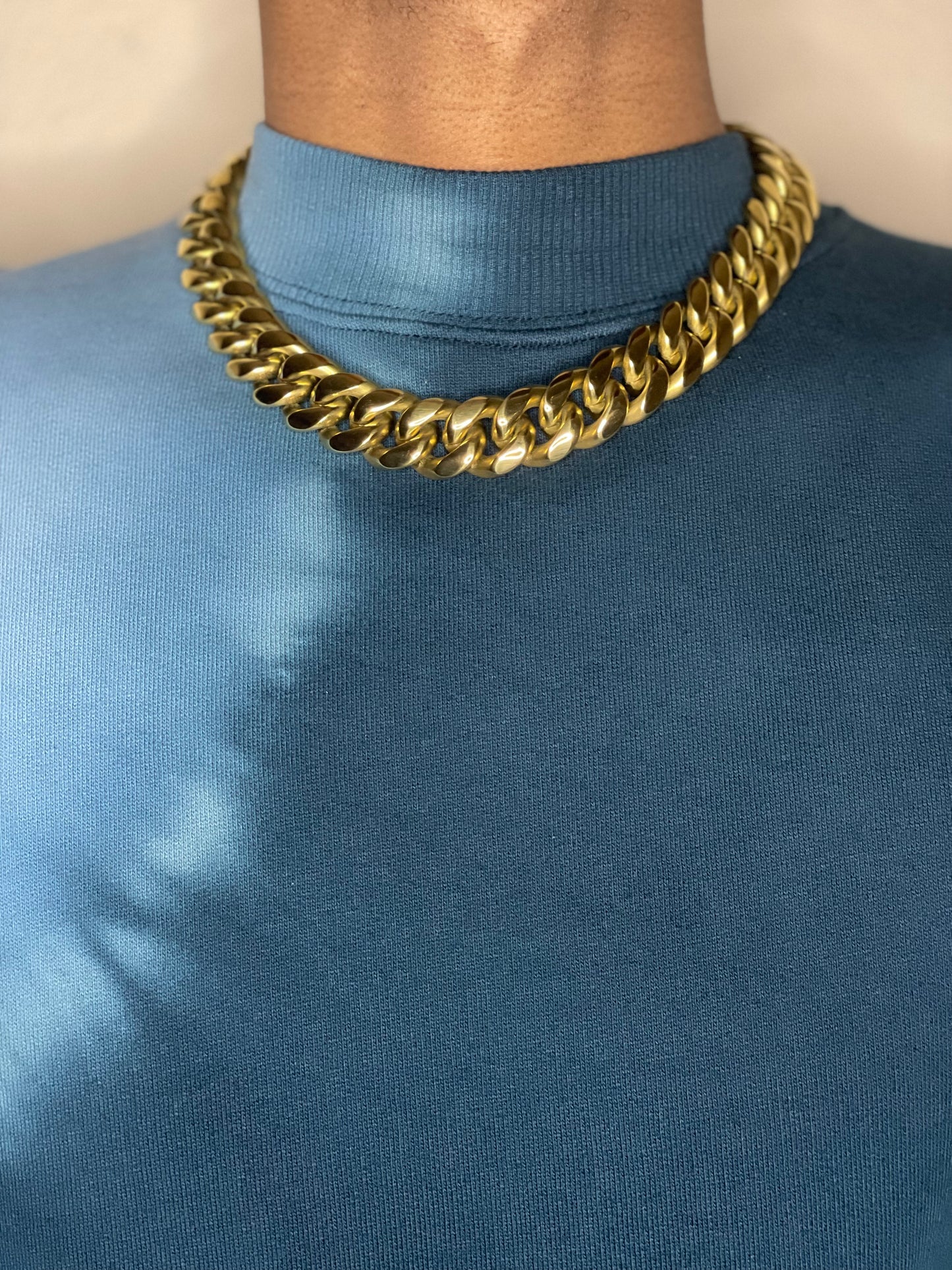 Image of gold18mm Miami Cuban Stainless Steel being worn by model.