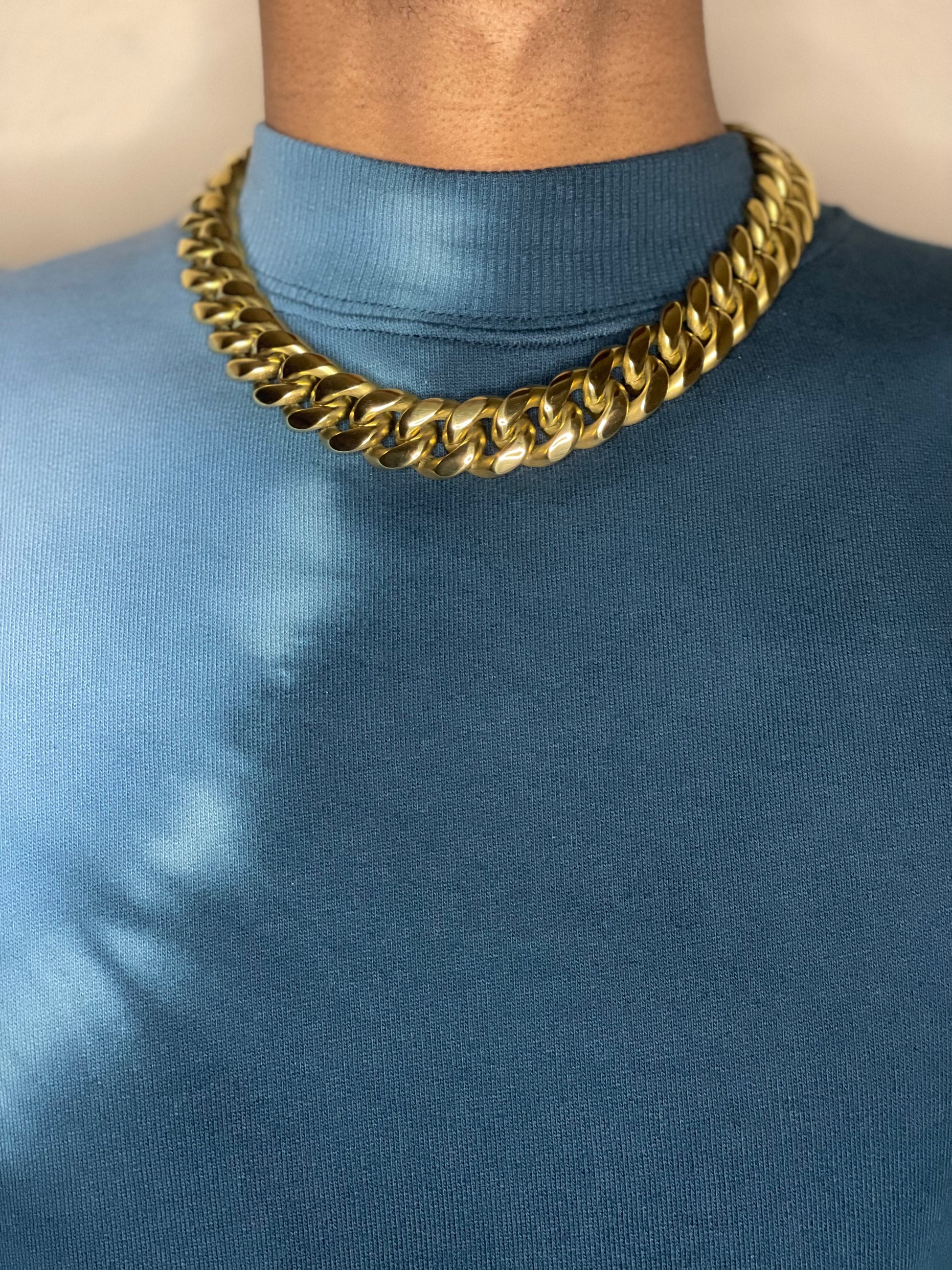 Image of gold18mm Miami Cuban Stainless Steel being worn by model.