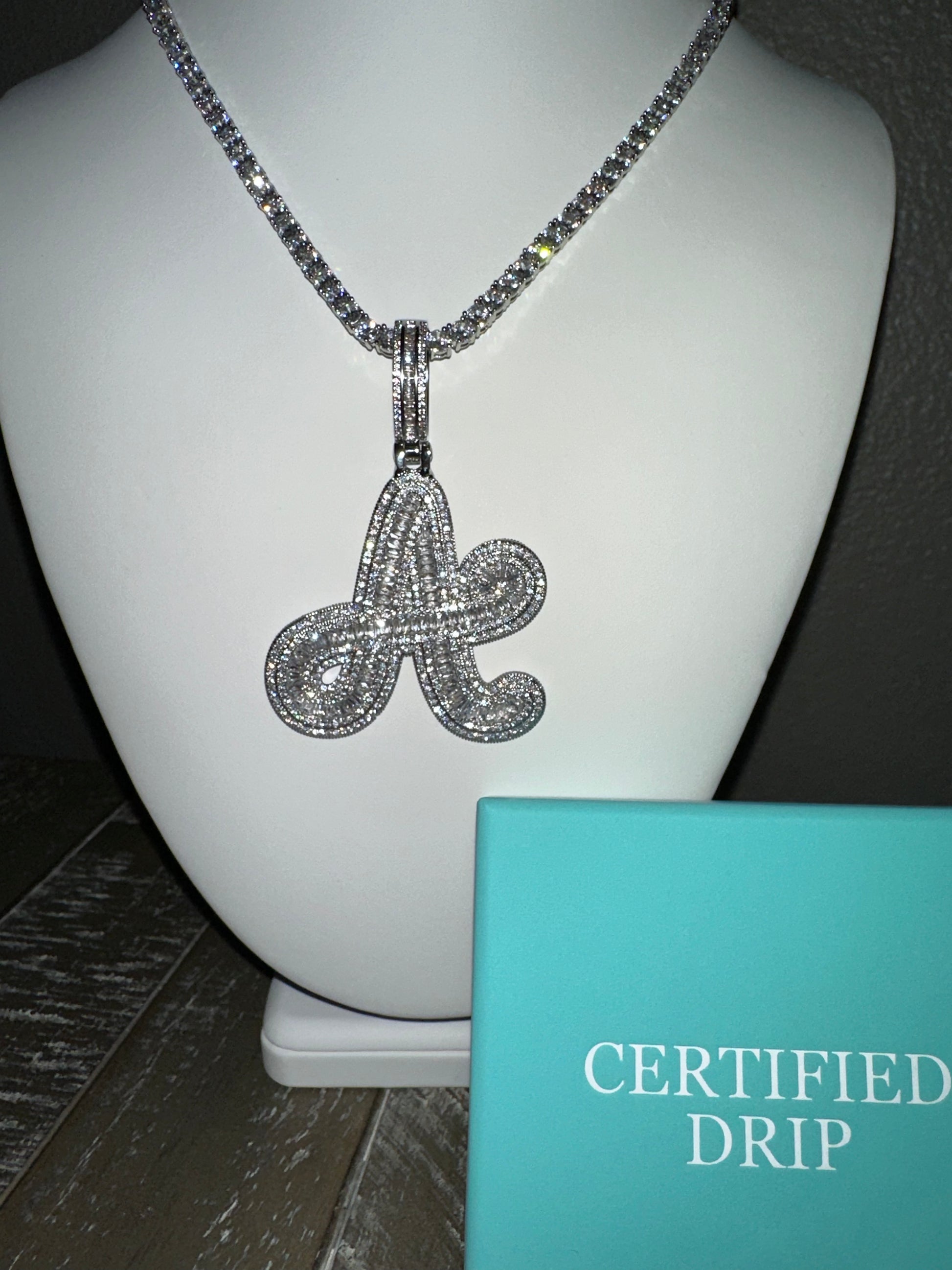 Image of cursive letter X tennis chain bundle. 