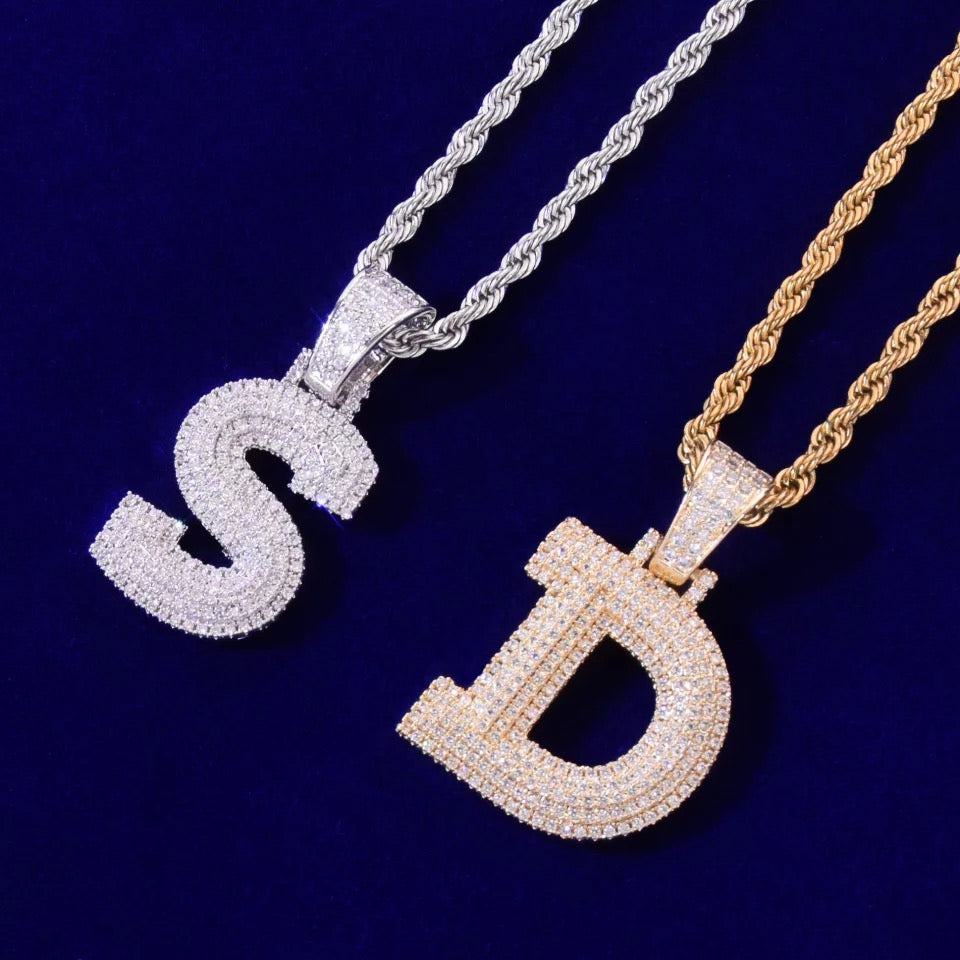 Image of silver icy 3 layered letter pendant. 