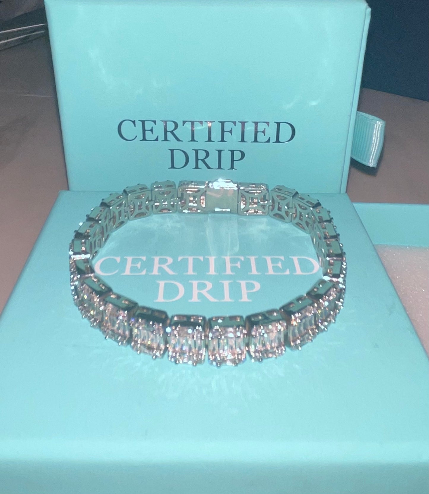 Image of silver icy 9mm baguette bracelet.