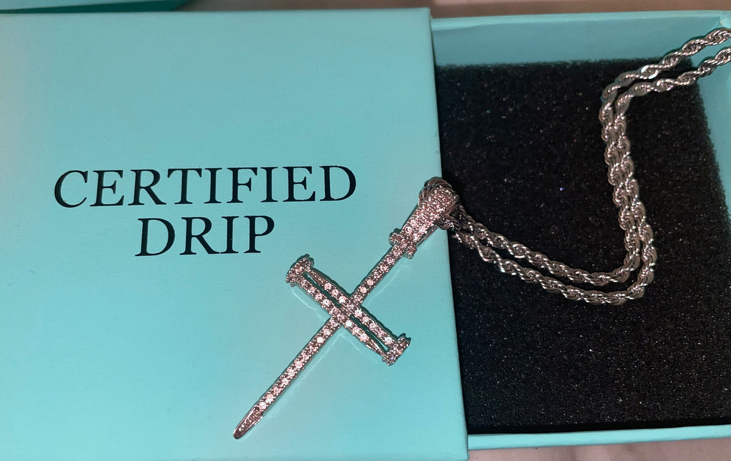 Iced Out Cross Nail Pendant